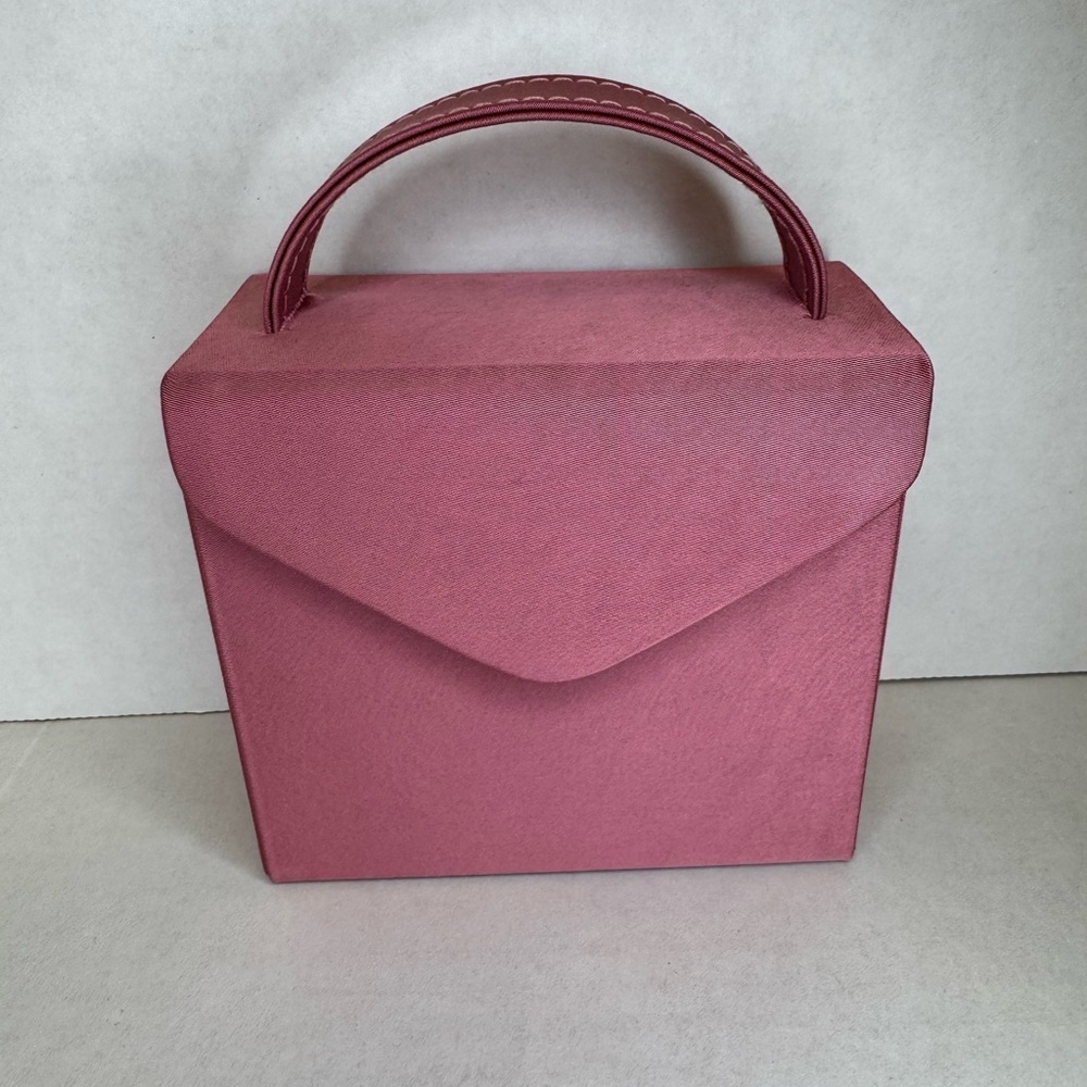 A New Day Chic Pink Mini Bag jewelry keeper for travel.